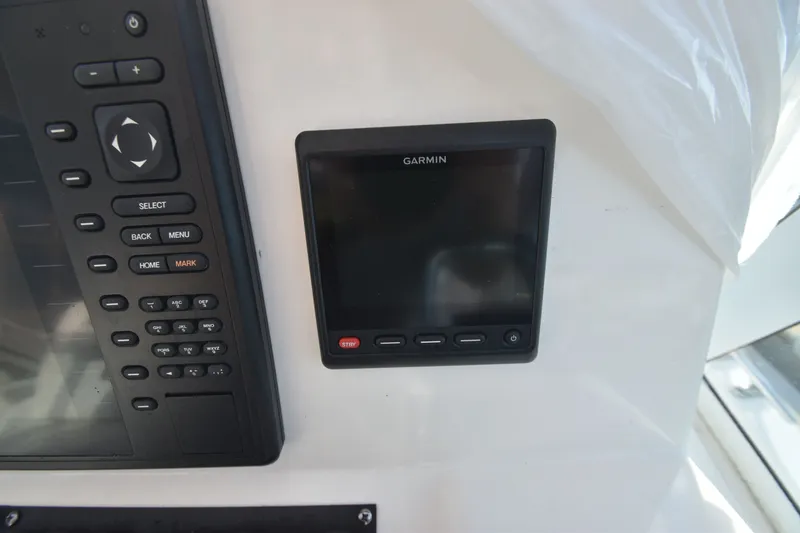 Slide: The Image of Garmin display and controls on 2017 Albemarle 25 Express. - 7