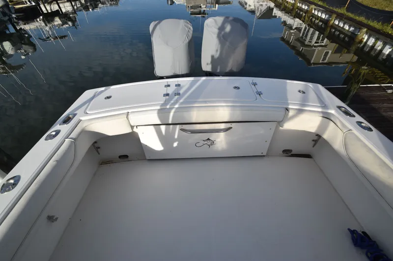 Slide: The Image of Albemarle 25 Express 2017, spacious cockpit at the dock. - 8