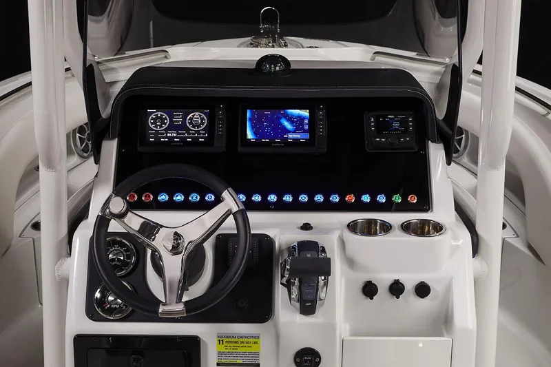 Slide: The Image of 2023 Finseeker 220cc boat dashboard with modern controls and navigation displays. - 3