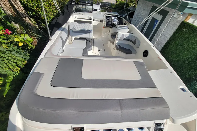Slide: The Image of 2023 Bayliner VR6 Bowrider OB with spacious seating and modern design. - 11