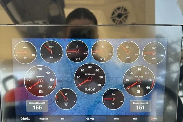 Slide: The Image of Dashboard of a 2022 Scout 277 Dorado boat displaying various gauges and readings. - 3