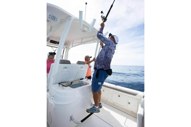 Slide: The Image of Manufacturer Provided Image: 2026 World Cat 295 CC boat with anglers fishing on open sea. - 8