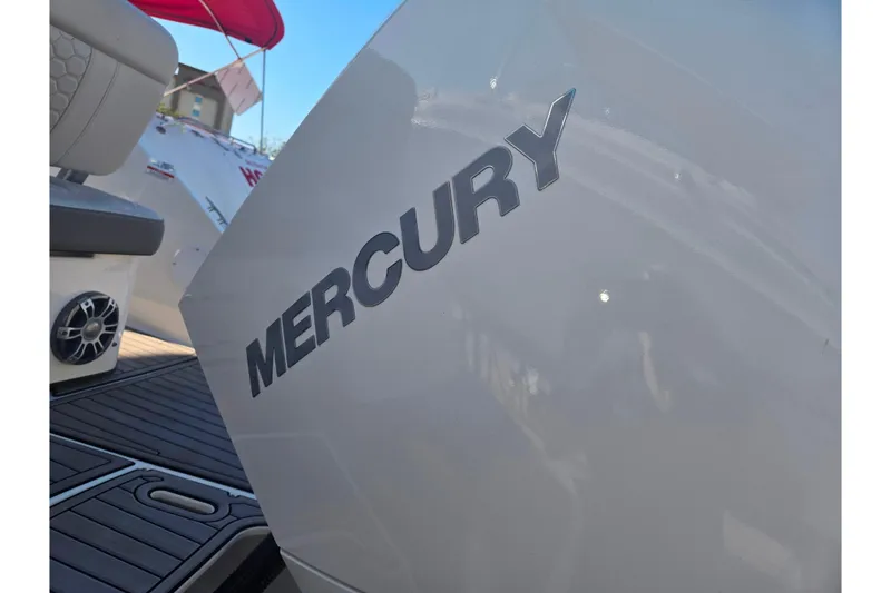 Slide: The Image of 2024 Sea Ray SDX 250 Outboard with Mercury engine, close-up view. - 19