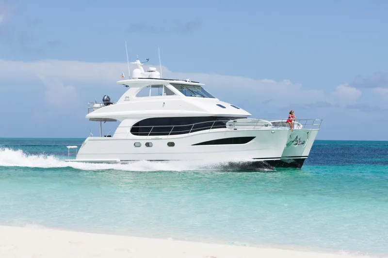 The Image of Luxury Horizon PC52 yacht cruising in turquoise waters, 2016 model. - 0