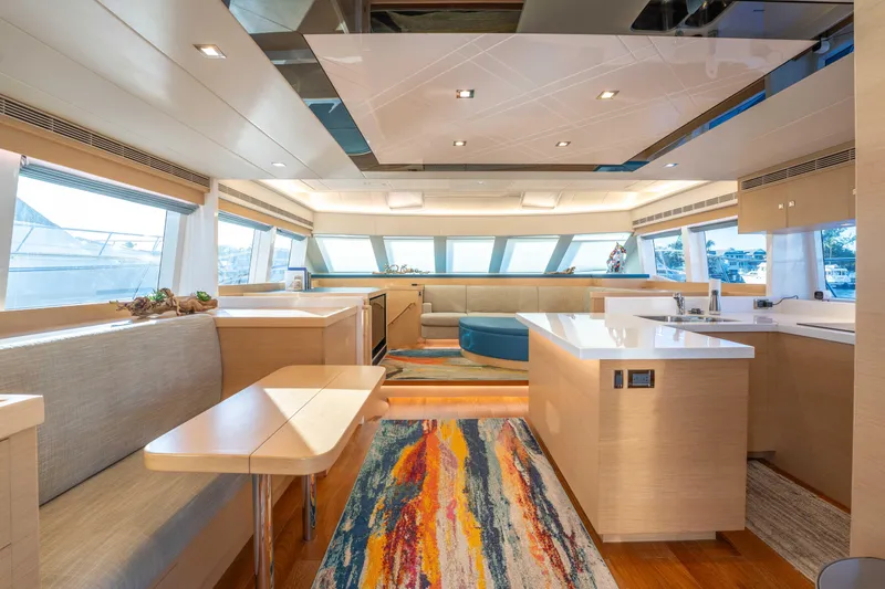 Slide: The Image of Luxurious interior of 2016 Horizon PC52 yacht with modern design and vibrant decor. - 1