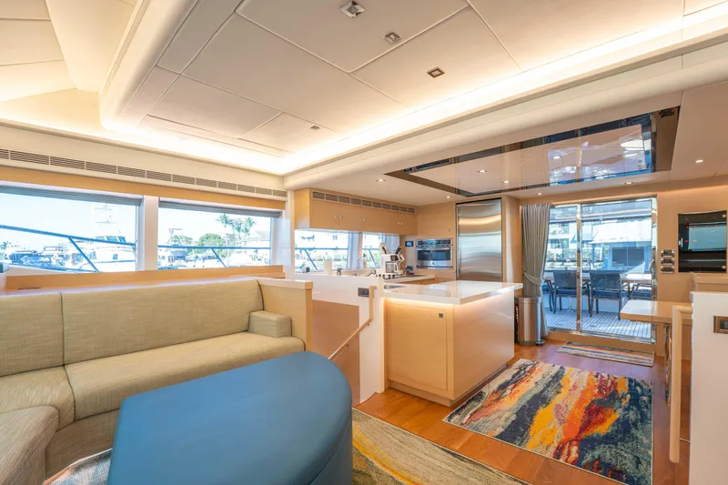 Slide: The Image of Luxurious interior of 2016 Horizon PC52 yacht with modern kitchen and seating area. - 12