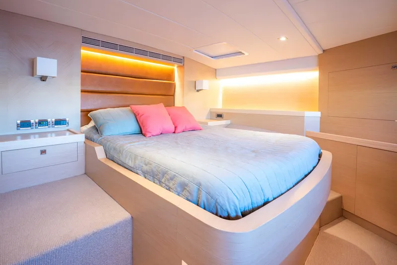 Slide: The Image of Luxurious bedroom interior of 2016 Horizon PC52 yacht with modern design and ambient lighting. - 16