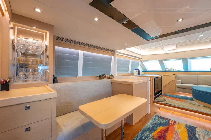 Slide: The Image of Luxurious interior of 2016 Horizon PC52 yacht with modern seating and elegant decor. - 2