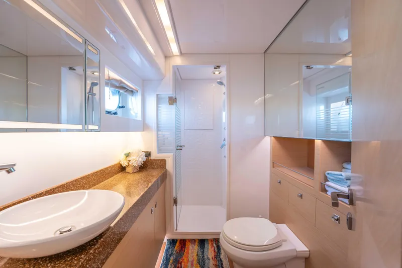 Slide: The Image of Luxurious bathroom in 2016 Horizon PC52 yacht with modern fixtures and elegant design. - 20