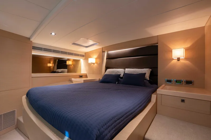 Slide: The Image of Luxurious cabin interior of 2016 Horizon PC52 yacht with elegant bedding and ambient lighting. - 24