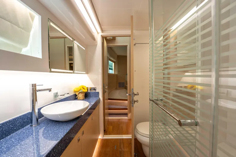 Slide: The Image of Luxurious bathroom interior of 2016 Horizon PC52 yacht with modern fixtures and elegant design. - 29