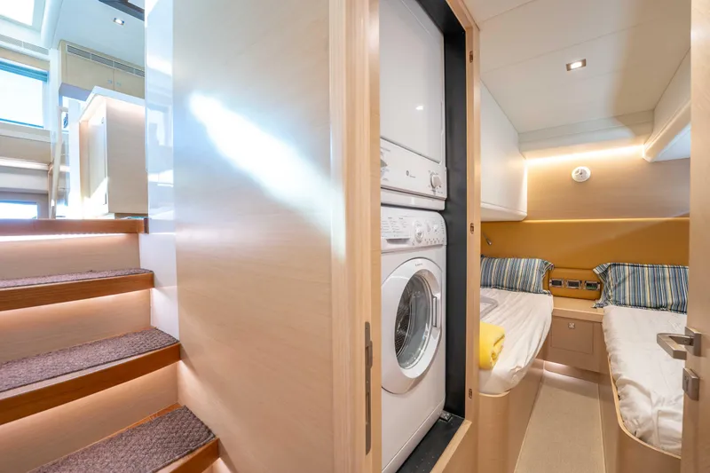 Slide: The Image of Interior of 2016 Horizon PC52 yacht with laundry and twin beds. - 31