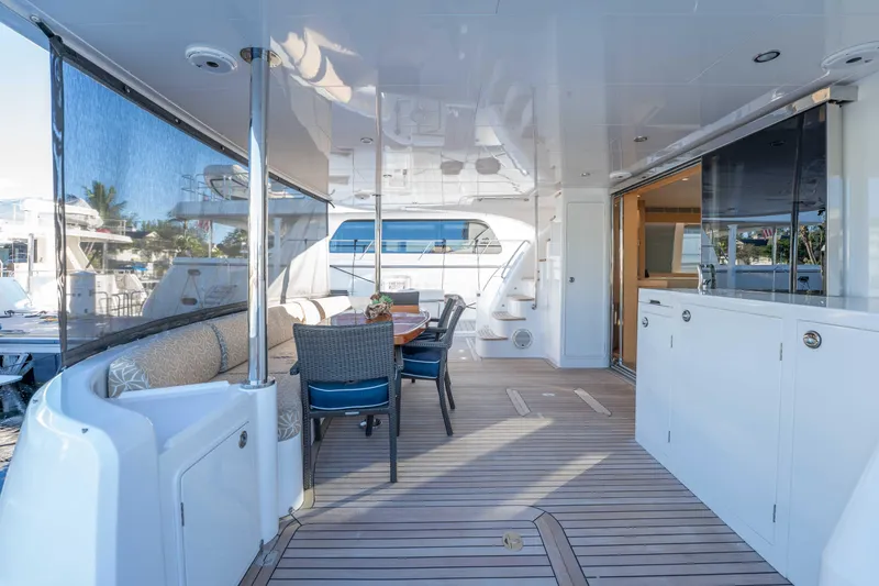 Slide: The Image of Luxurious 2016 Horizon PC52 yacht interior with elegant seating and dining area. - 36