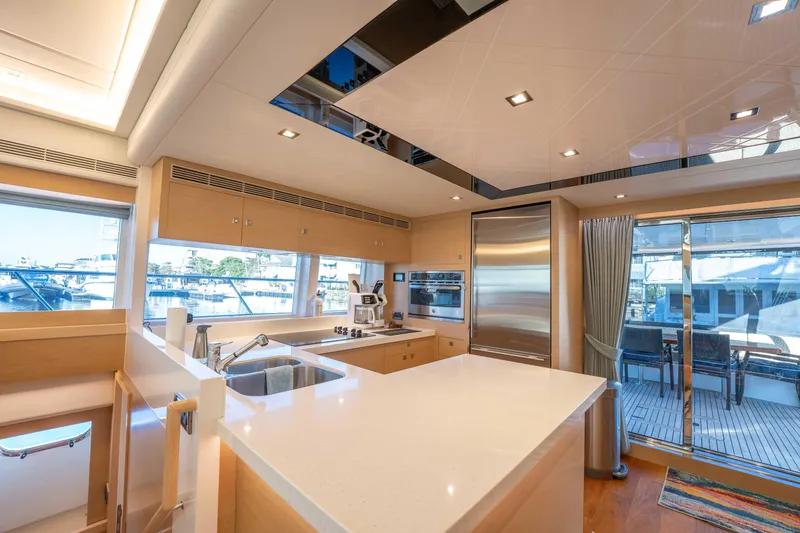 Slide: The Image of Luxurious kitchen interior of 2016 Horizon PC52 yacht with modern appliances and sleek design. - 7