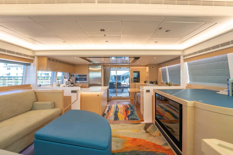 Slide: The Image of Luxurious interior of 2016 Horizon PC52 yacht with modern furnishings and vibrant decor. - 8