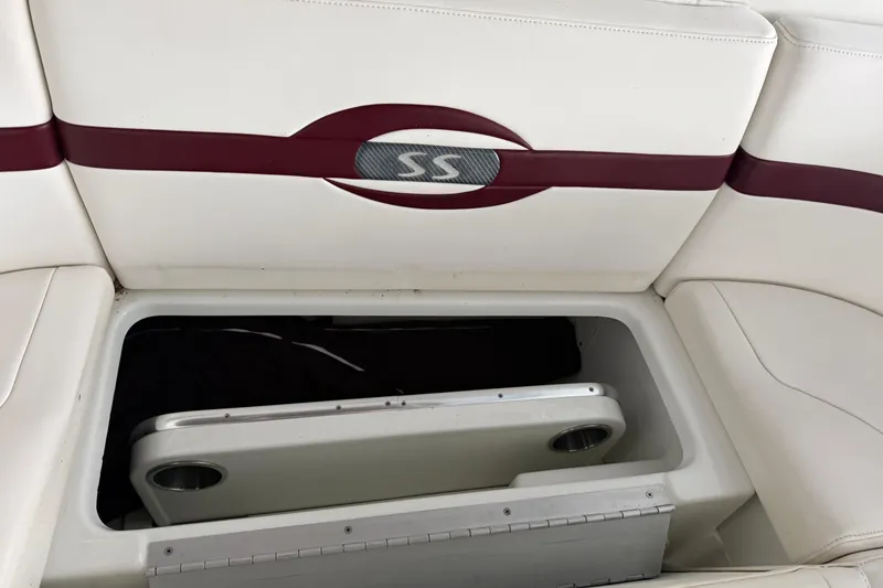 Slide: The Image of 2007 Formula 310 Sun Sport boat interior storage compartment with table. - 17