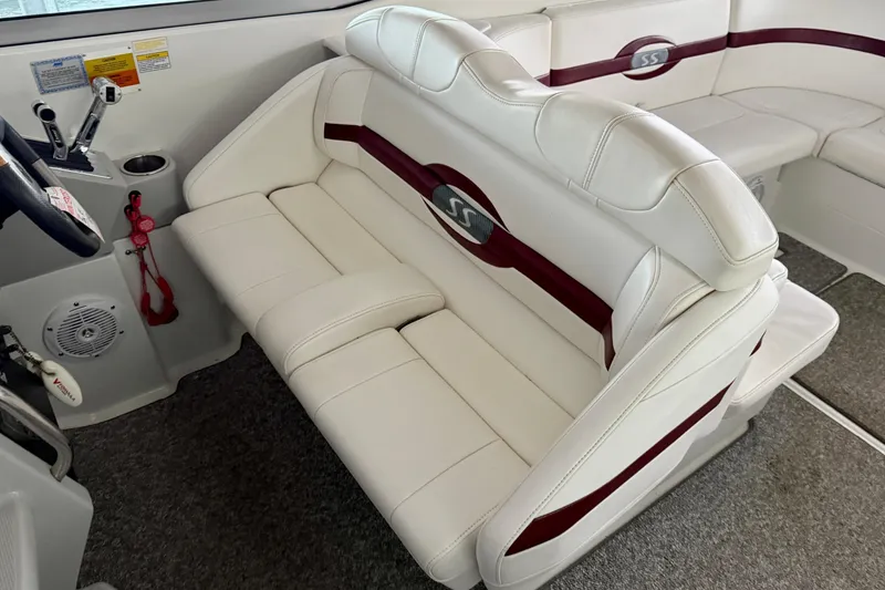 Slide: The Image of 2007 Formula 310 Sun Sport boat interior with white leather seating and red accents. - 21