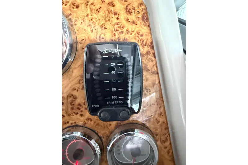 Slide: The Image of Dashboard of 2007 Formula 310 Sun Sport with Bennett trim tabs indicator. - 24