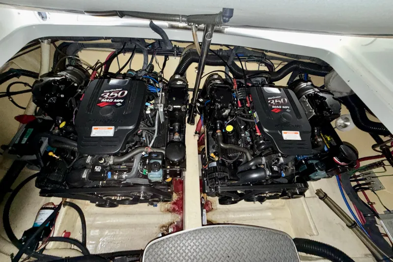 Slide: The Image of 2007 Formula 310 Sun Sport engine compartment with twin MerCruiser 350 MAG MPI engines. - 29