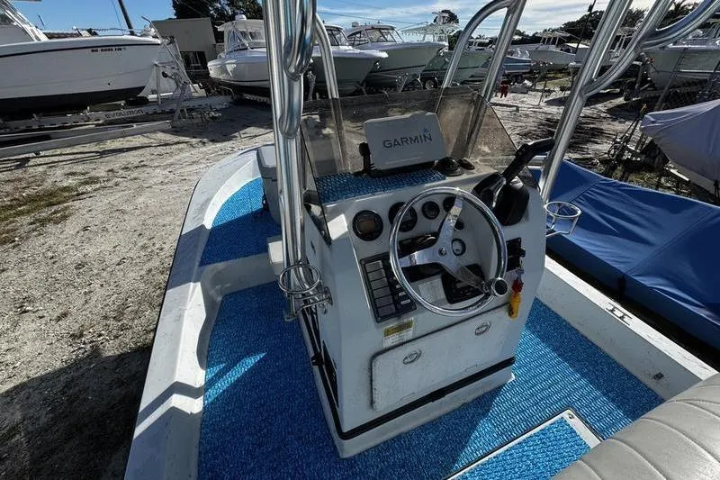 Slide: The Image of 2001 Gulf Coast 200 boat interior with Garmin navigation system. - 17