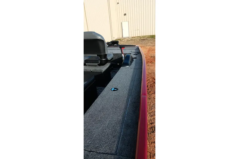 Slide: The Image of 2026 Tracker Panfish 17 boat deck, featuring sleek design and modern equipment. - 16