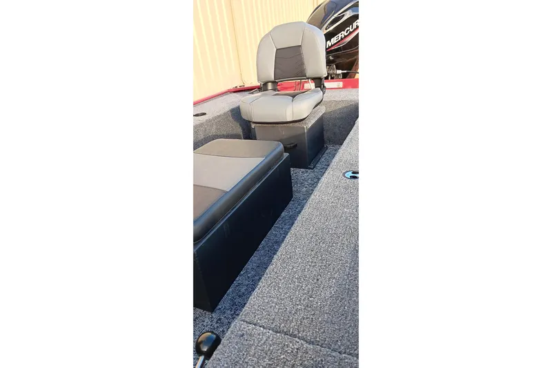 Slide: The Image of 2026 Tracker Panfish 17 boat interior with seating and carpeted deck. - 7