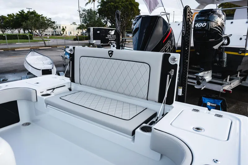 Slide: The Image of 2026 Barker Boatworks 26 Open with luxurious seating and powerful Mercury engines. - 6