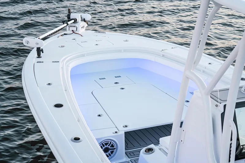 Slide: The Image of 2026 Barker Boatworks 26 Open on water, featuring sleek design and modern amenities. - 26