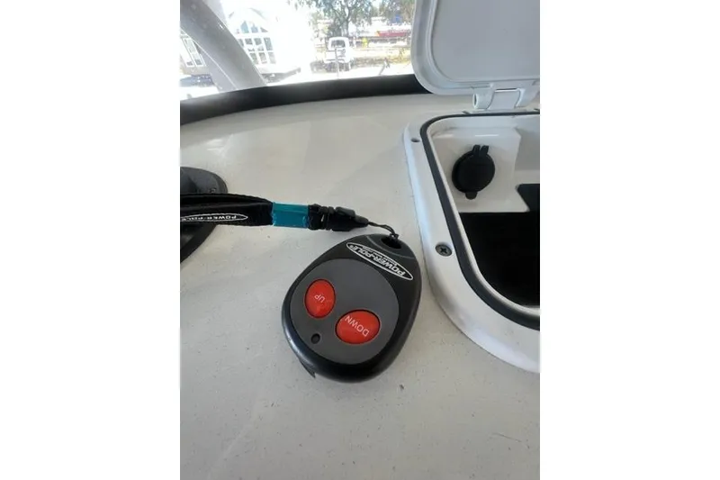 Slide: The Image of Remote control on a Seapro 248 boat dashboard, 2021 model. - 10