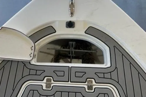 Slide: The Image of 2021 Seapro 248 boat deck with storage compartment and non-slip surface. - 14