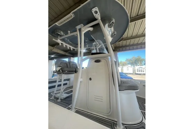 Slide: The Image of 2021 Seapro 248 boat interior with seating and overhead console. - 31