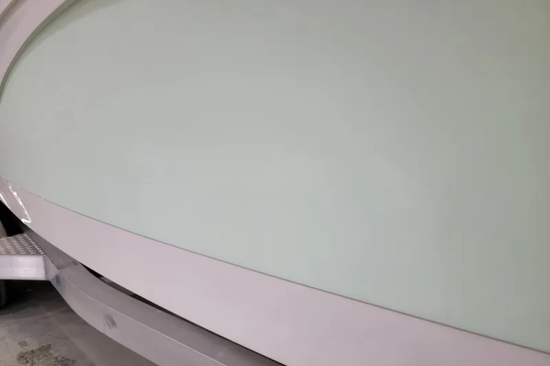 Slide: The Image of 2025 Ranger 2360 Bay boat hull close-up, showcasing sleek design and smooth finish. - 2