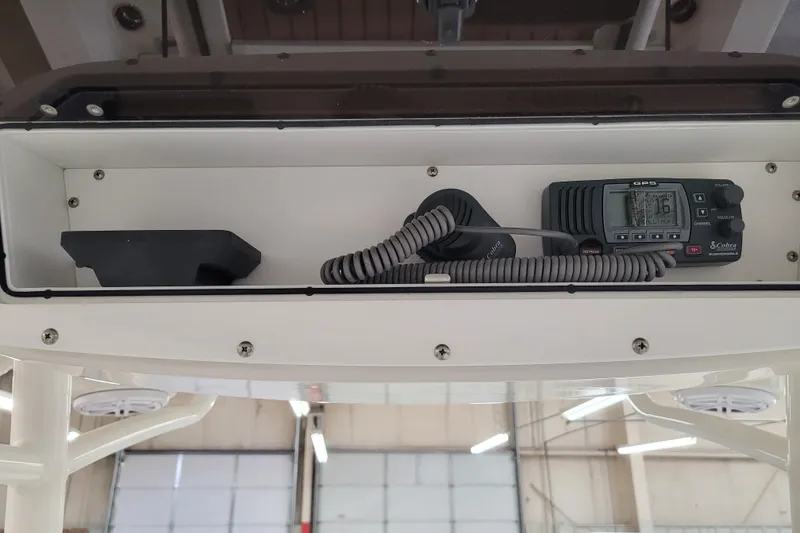 Slide: The Image of 2025 Ranger 2360 Bay boat console with GPS and radio equipment. - 29