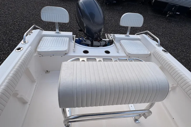 Slide: The Image of 2018 Release Boatworks 196 RK interior with seating and motor. - 12