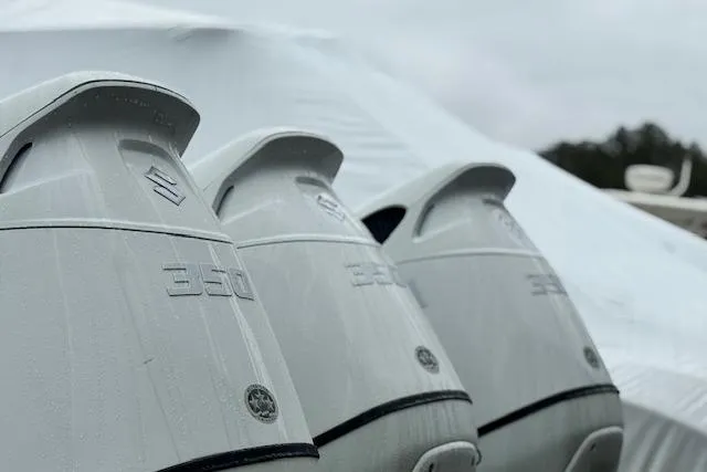 Slide: The Image of Three Suzuki 350 outboard motors on a 2018 Cape Horn 36 XS boat. - 6