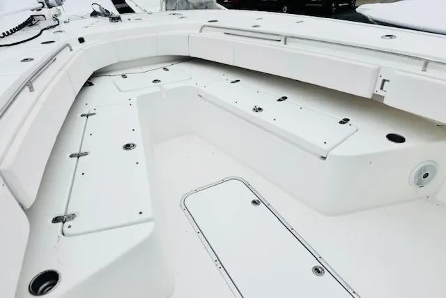 Slide: The Image of 2018 Cape Horn 36 XS boat interior with spacious seating and storage compartments. - 8