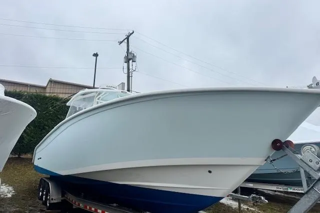 The Image of 2018 Cape Horn 36 XS boat on trailer, overcast sky background. - 1