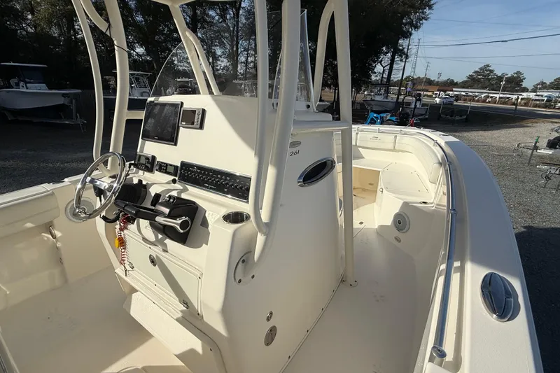 Slide: The Image of 2017 Cobia boat interior with steering console and navigation equipment. - 11