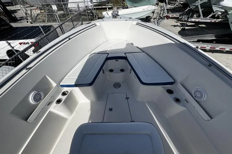 Slide: The Image of 2010 Sailfish 2860 CC boat interior with seating and storage compartments. - 9