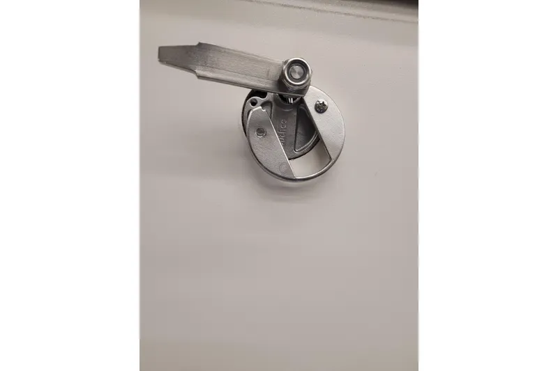 Slide: The Image of 2023 Ranger Z521R metal latch on white surface. - 20