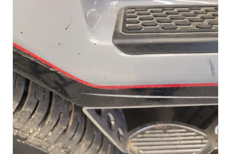 Slide: The Image of Close-up of 2023 Ranger Z521R vehicle detailing with red trim and tire tread. - 29