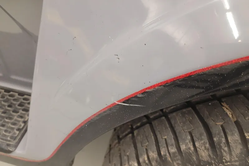 Slide: The Image of Close-up of 2023 Ranger Z521R tire and fender with red trim detail. - 30