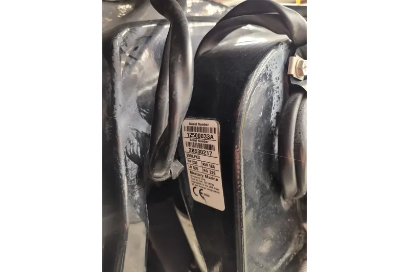 Slide: The Image of Close-up of a 2023 Ranger Z521R model label with serial number details. - 38