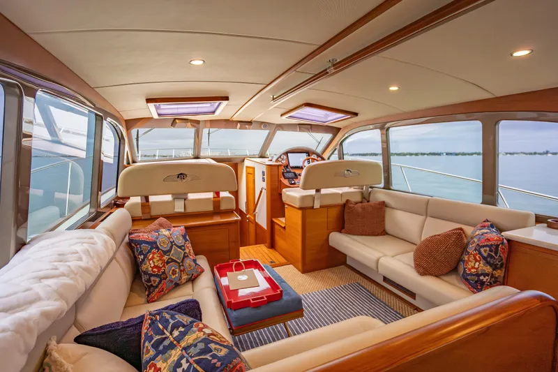 Slide: The Image of Luxurious interior of 2020 Palm Beach Motor Yachts PB50 with elegant seating and scenic views. - 19