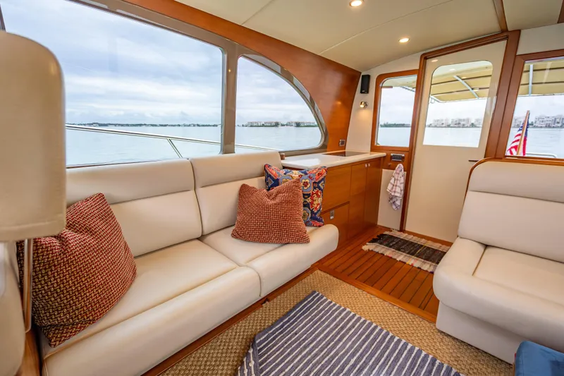 Slide: The Image of Luxurious interior of 2020 Palm Beach Motor Yachts PB50 with elegant seating and scenic views. - 27