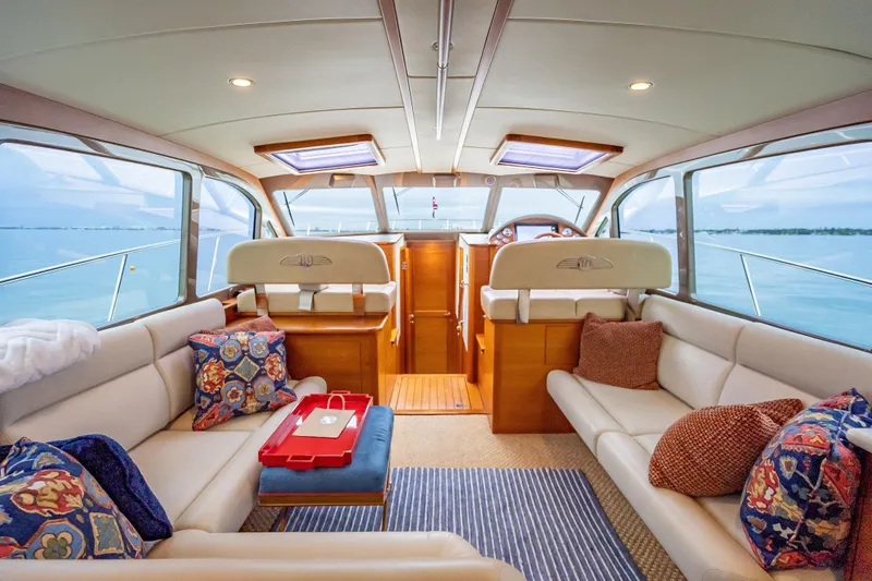 Slide: The Image of Luxurious interior of 2020 Palm Beach Motor Yachts PB50 with elegant seating and scenic ocean views. - 25