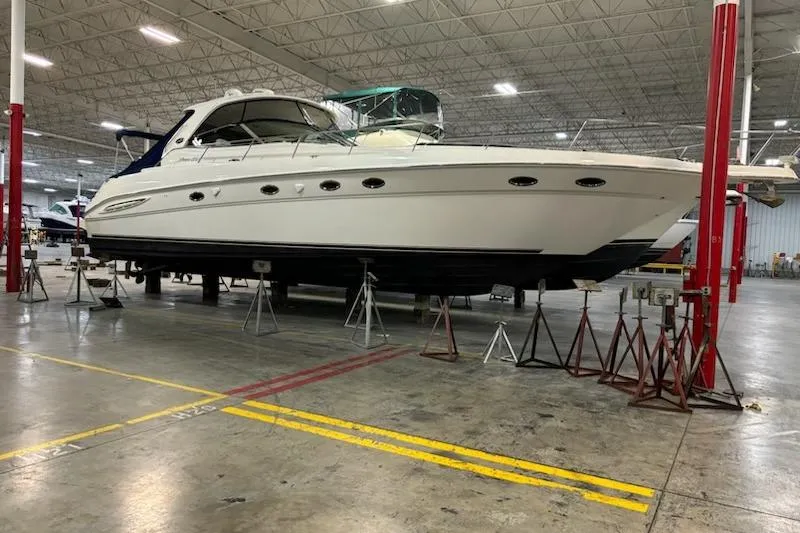 Slide: The Image of 2001 Sea Ray 460 Sundancer yacht in indoor storage facility. - 4