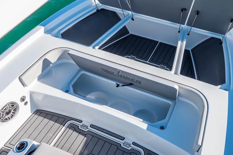 Slide: The Image of 2026 Barker Boatworks 26 Calibogue Bay interior with storage compartments and sleek design. - 13