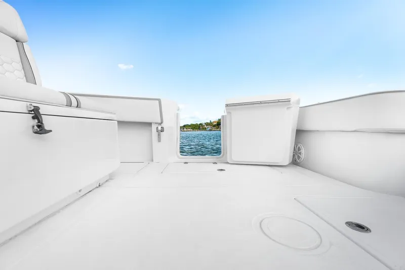 Slide: The Image of 2021 SeaHunter 39 Tournament boat interior with open deck and water view. - 12