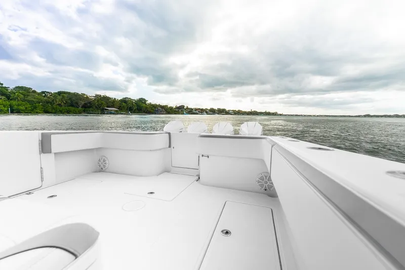 Slide: The Image of 2021 SeaHunter 39 Tournament boat deck with scenic water view. - 13